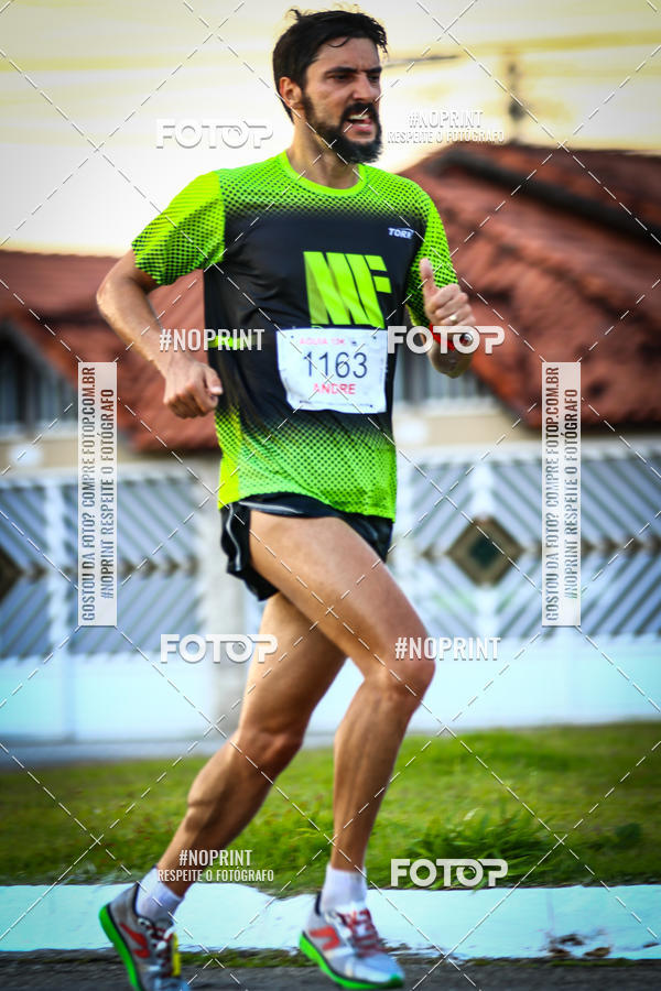 Buy your photos of the eventguia 13K Praia Grande on Fotop