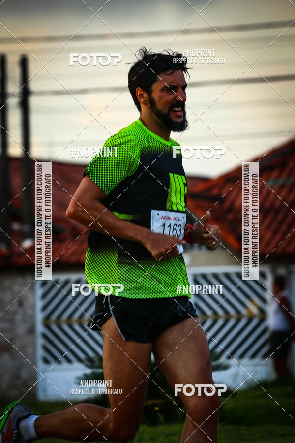Buy your photos of the eventguia 13K Praia Grande on Fotop