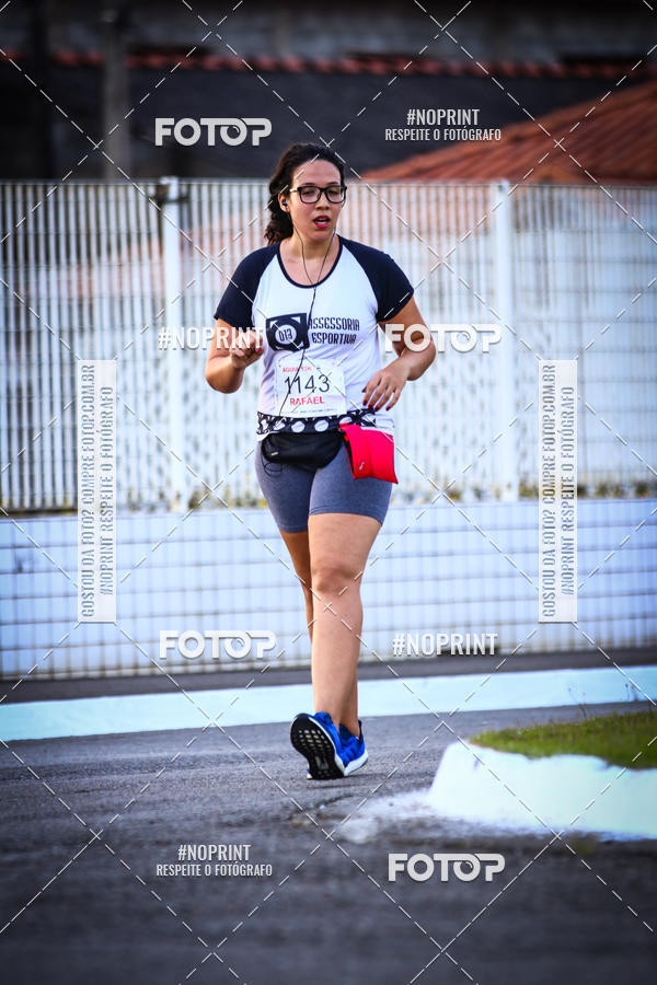 Buy your photos of the eventguia 13K Praia Grande on Fotop
