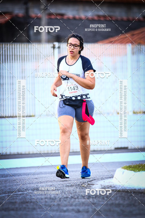 Buy your photos of the eventguia 13K Praia Grande on Fotop