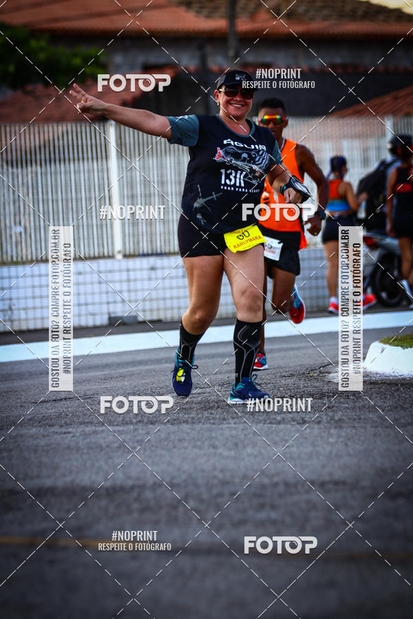 Buy your photos of the eventguia 13K Praia Grande on Fotop