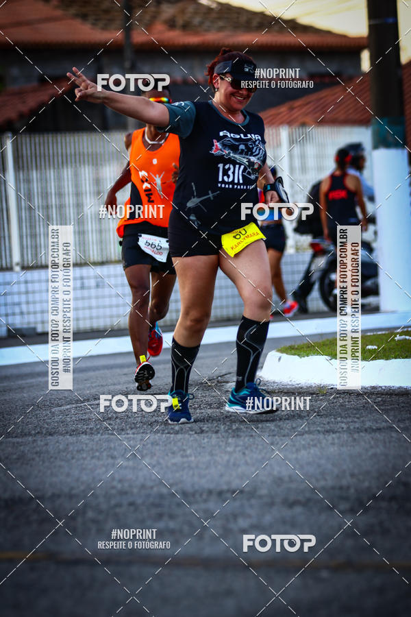 Buy your photos of the eventguia 13K Praia Grande on Fotop