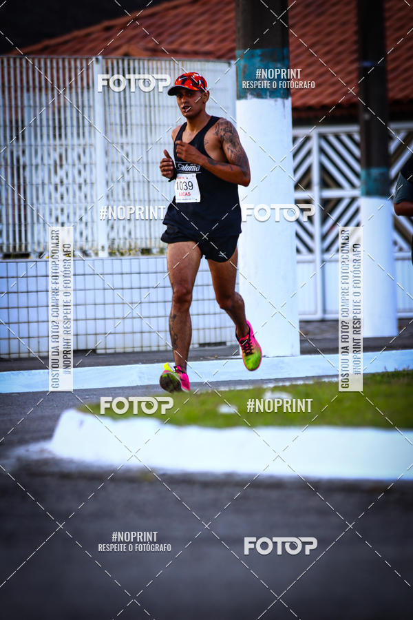 Buy your photos of the eventguia 13K Praia Grande on Fotop