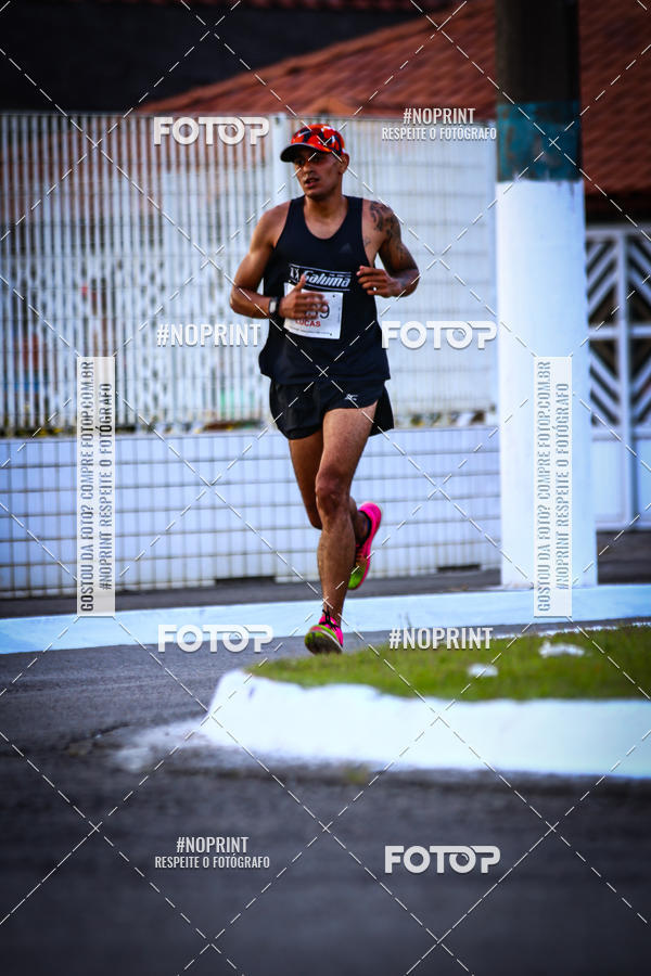 Buy your photos of the eventguia 13K Praia Grande on Fotop