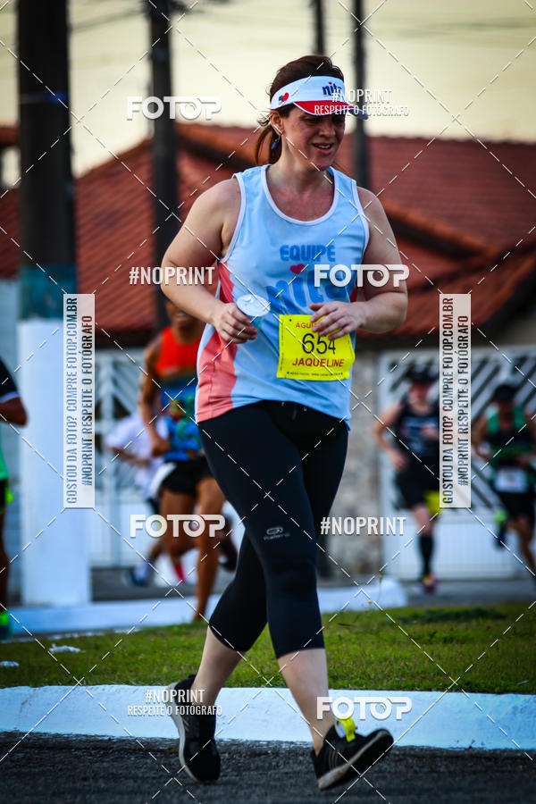 Buy your photos of the eventguia 13K Praia Grande on Fotop