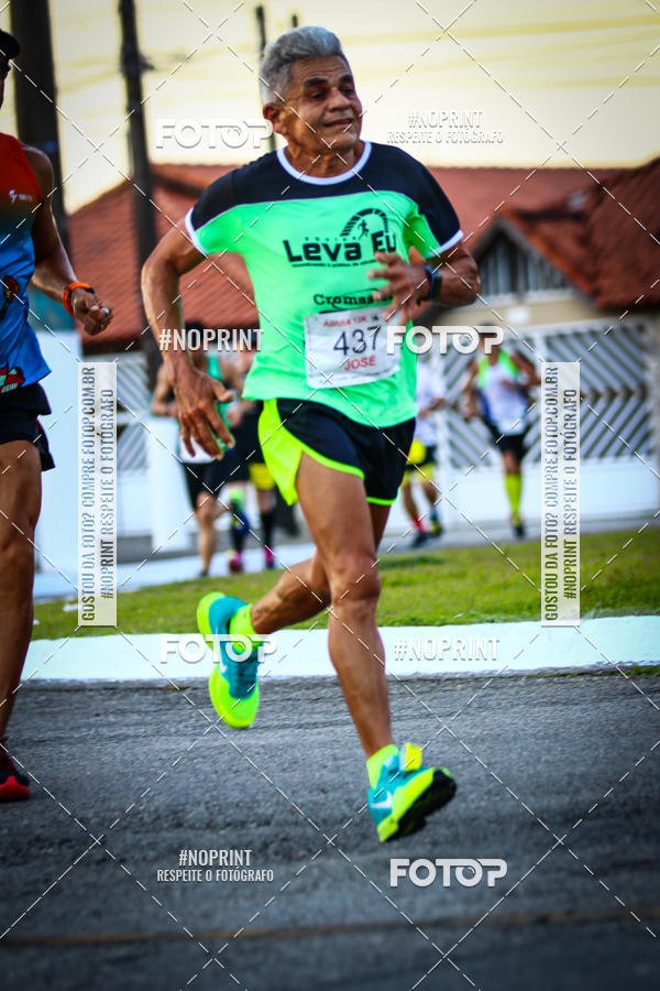 Buy your photos of the eventguia 13K Praia Grande on Fotop