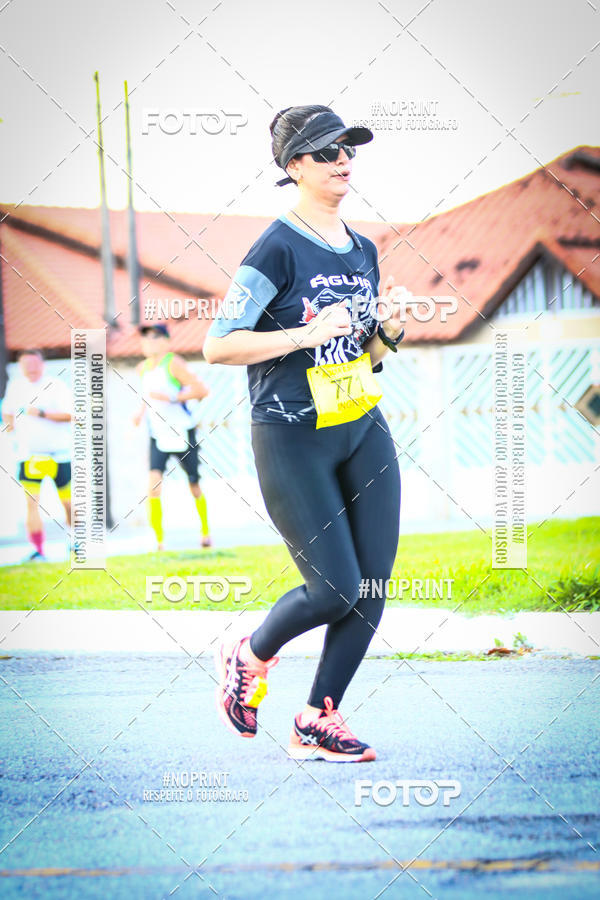 Buy your photos of the eventguia 13K Praia Grande on Fotop