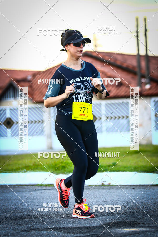 Buy your photos of the eventguia 13K Praia Grande on Fotop