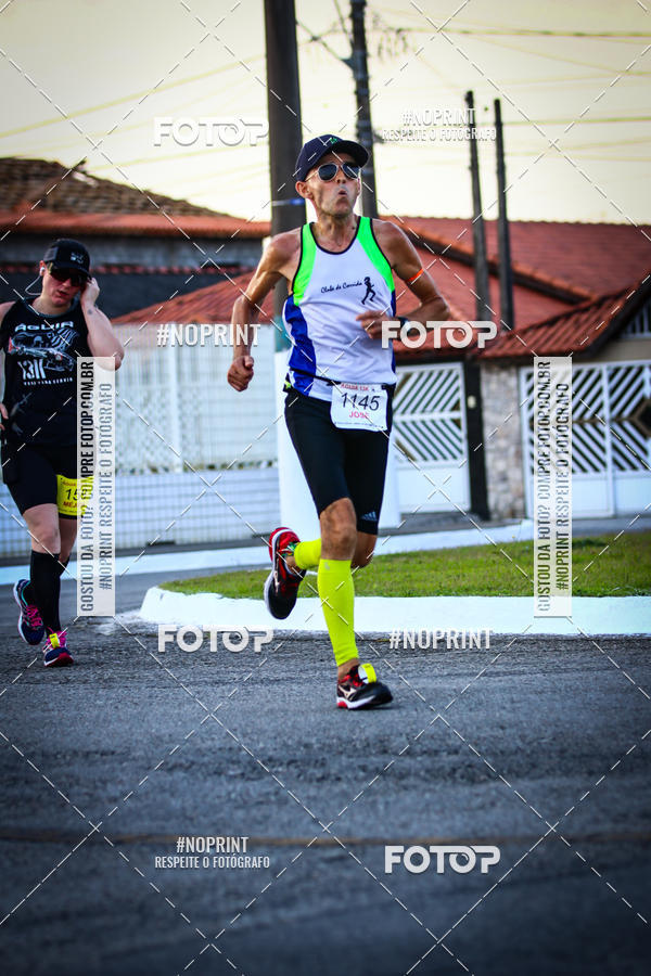 Buy your photos of the eventguia 13K Praia Grande on Fotop