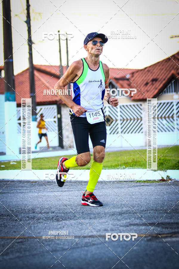Buy your photos of the eventguia 13K Praia Grande on Fotop