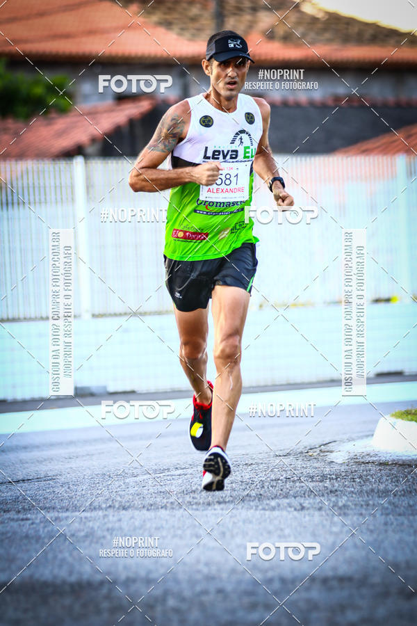 Buy your photos of the eventguia 13K Praia Grande on Fotop