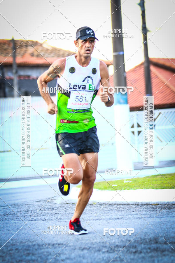 Buy your photos of the eventguia 13K Praia Grande on Fotop