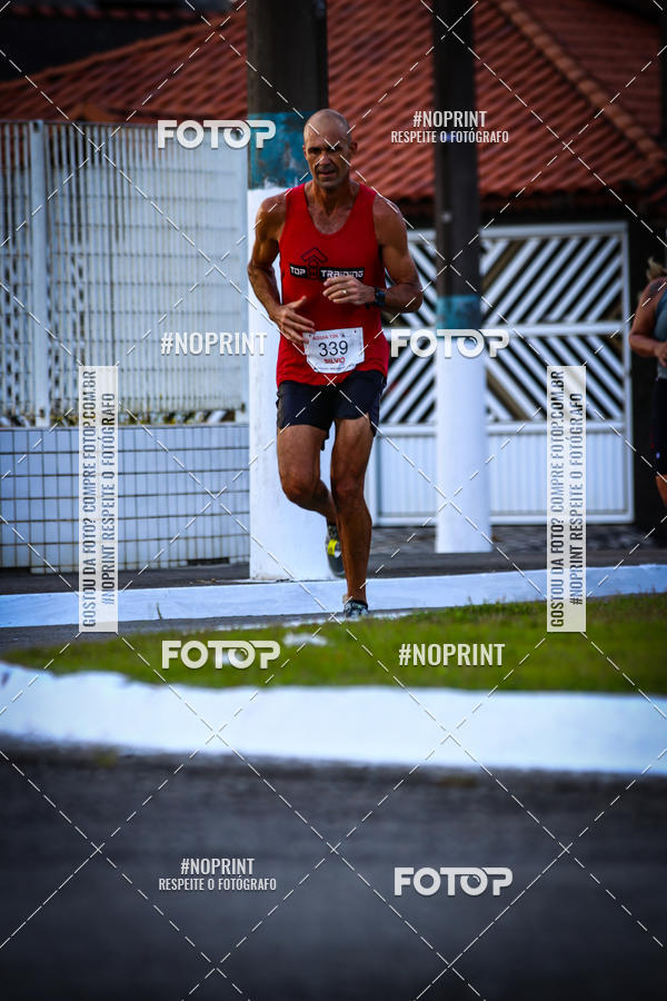Buy your photos of the eventguia 13K Praia Grande on Fotop