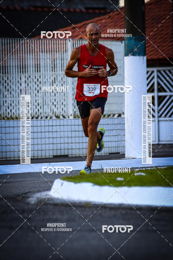Buy your photos of the eventguia 13K Praia Grande on Fotop