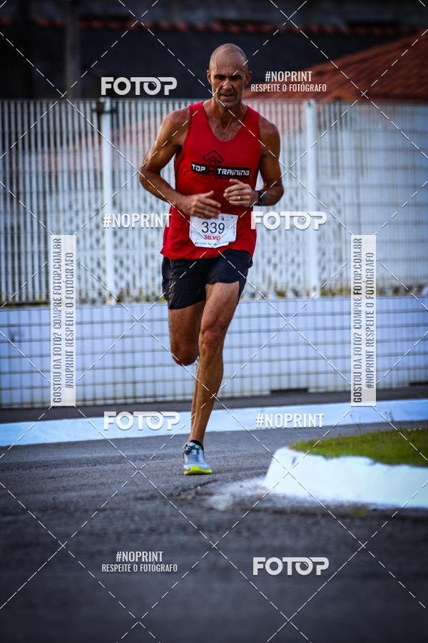 Buy your photos of the eventguia 13K Praia Grande on Fotop