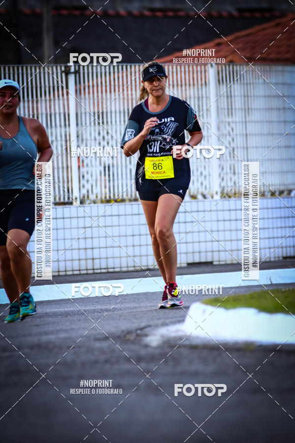 Buy your photos of the eventguia 13K Praia Grande on Fotop