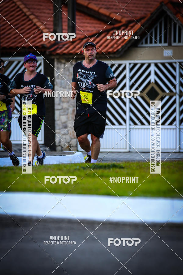 Buy your photos of the eventguia 13K Praia Grande on Fotop