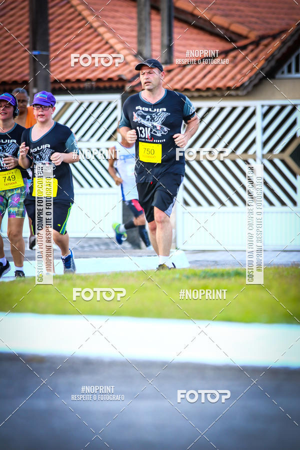 Buy your photos of the eventguia 13K Praia Grande on Fotop