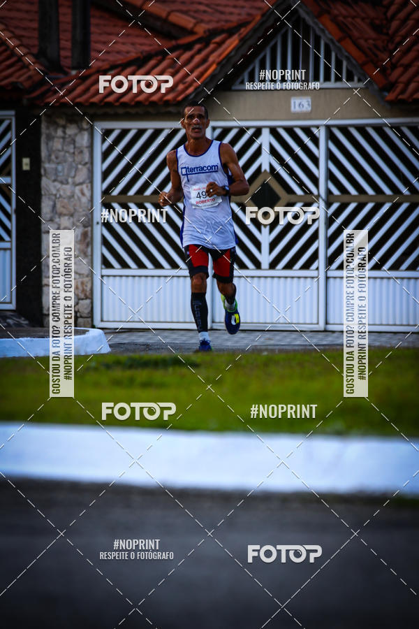 Buy your photos of the eventguia 13K Praia Grande on Fotop