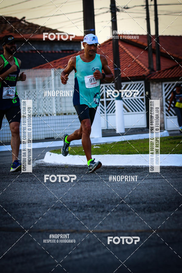 Buy your photos of the eventguia 13K Praia Grande on Fotop