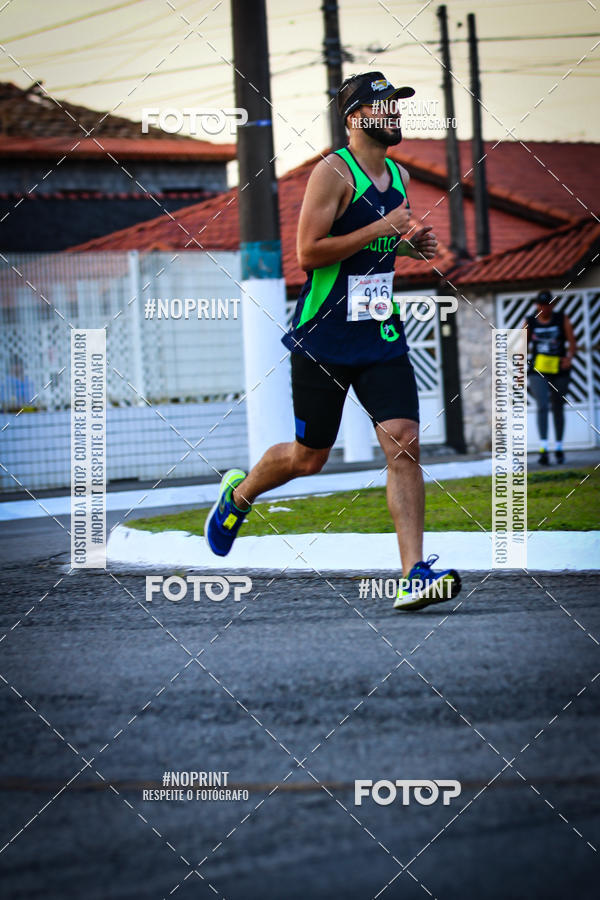 Buy your photos of the eventguia 13K Praia Grande on Fotop