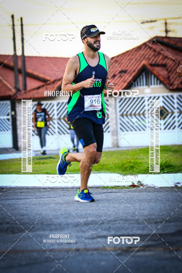 Buy your photos of the eventguia 13K Praia Grande on Fotop