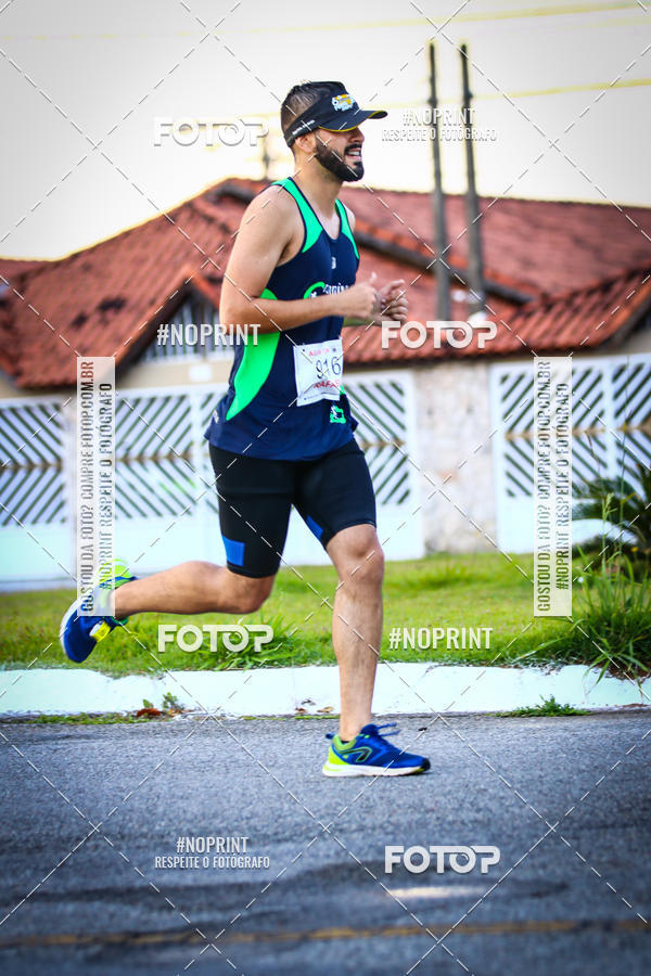Buy your photos of the eventguia 13K Praia Grande on Fotop
