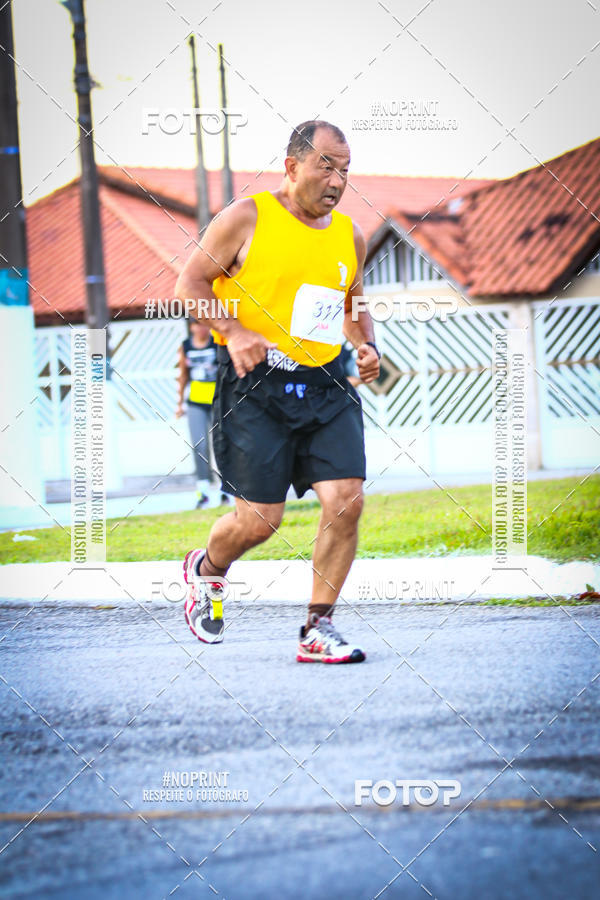 Buy your photos of the eventguia 13K Praia Grande on Fotop