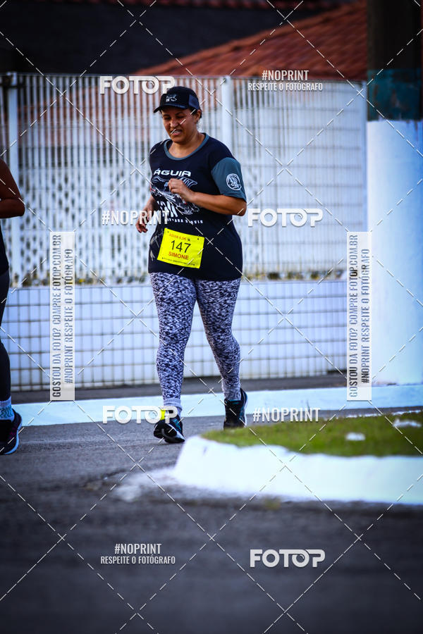 Buy your photos of the eventguia 13K Praia Grande on Fotop