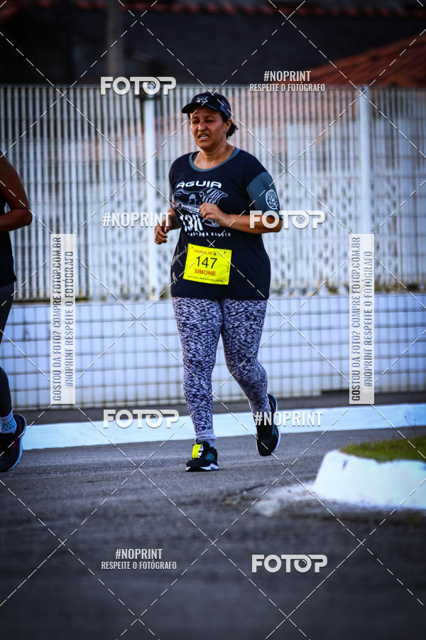 Buy your photos of the eventguia 13K Praia Grande on Fotop