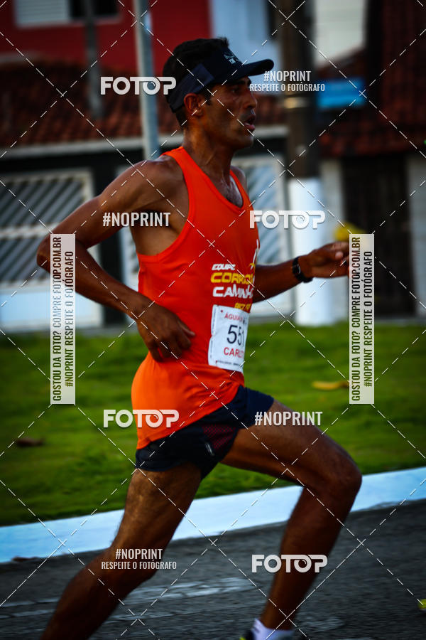 Buy your photos of the eventguia 13K Praia Grande on Fotop