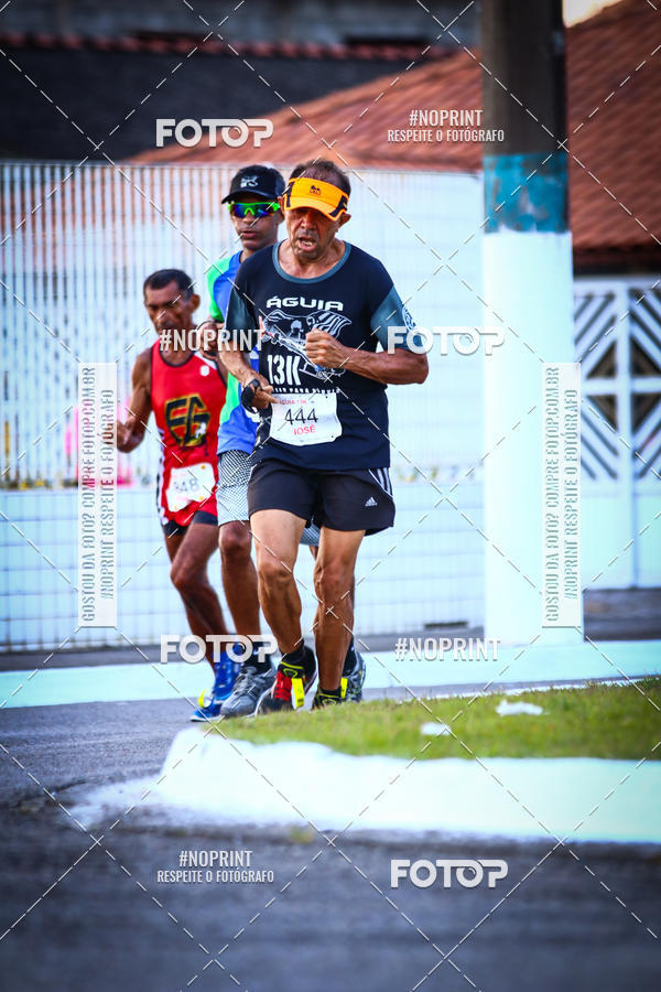 Buy your photos of the eventguia 13K Praia Grande on Fotop