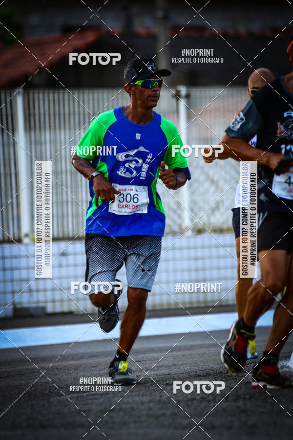 Buy your photos of the eventguia 13K Praia Grande on Fotop