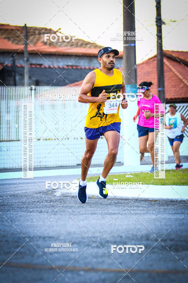 Buy your photos of the eventguia 13K Praia Grande on Fotop