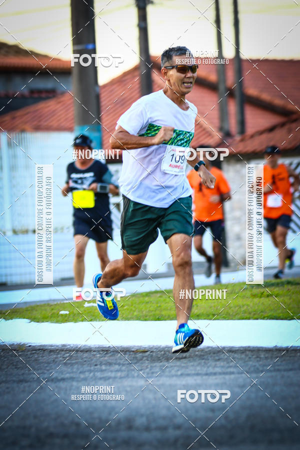 Buy your photos of the eventguia 13K Praia Grande on Fotop