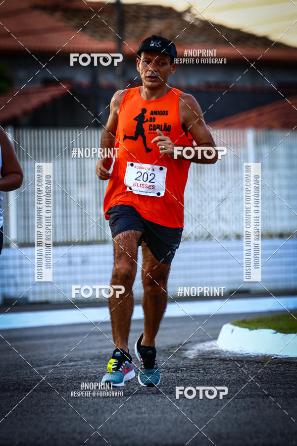 Buy your photos of the eventguia 13K Praia Grande on Fotop