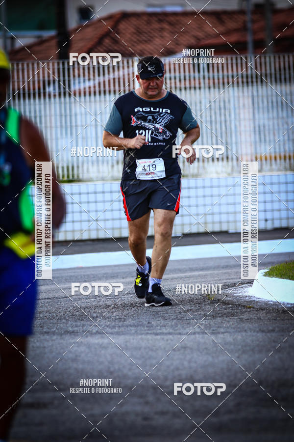 Buy your photos of the eventguia 13K Praia Grande on Fotop