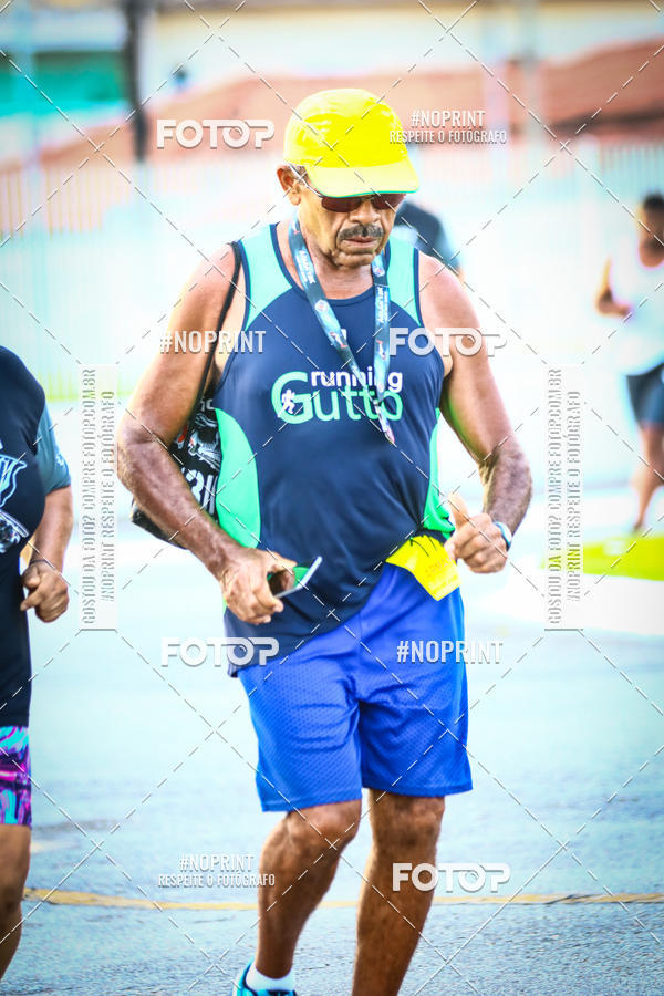 Buy your photos of the eventguia 13K Praia Grande on Fotop
