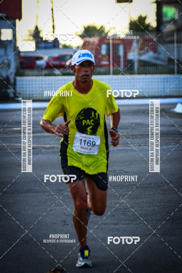 Buy your photos of the eventguia 13K Praia Grande on Fotop