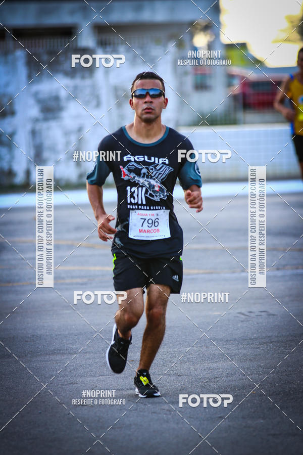 Buy your photos of the eventguia 13K Praia Grande on Fotop