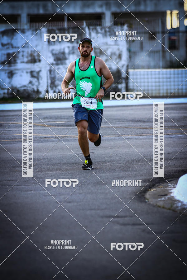 Buy your photos of the eventguia 13K Praia Grande on Fotop