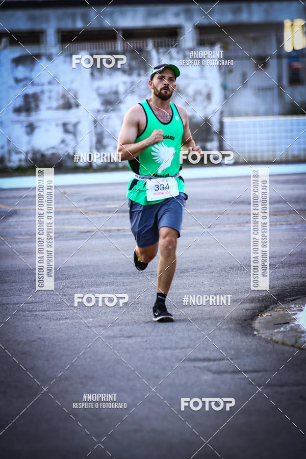 Buy your photos of the eventguia 13K Praia Grande on Fotop
