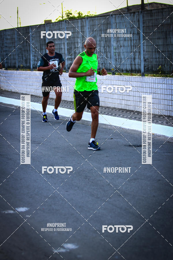 Buy your photos of the eventguia 13K Praia Grande on Fotop