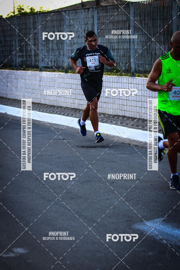 Buy your photos of the eventguia 13K Praia Grande on Fotop