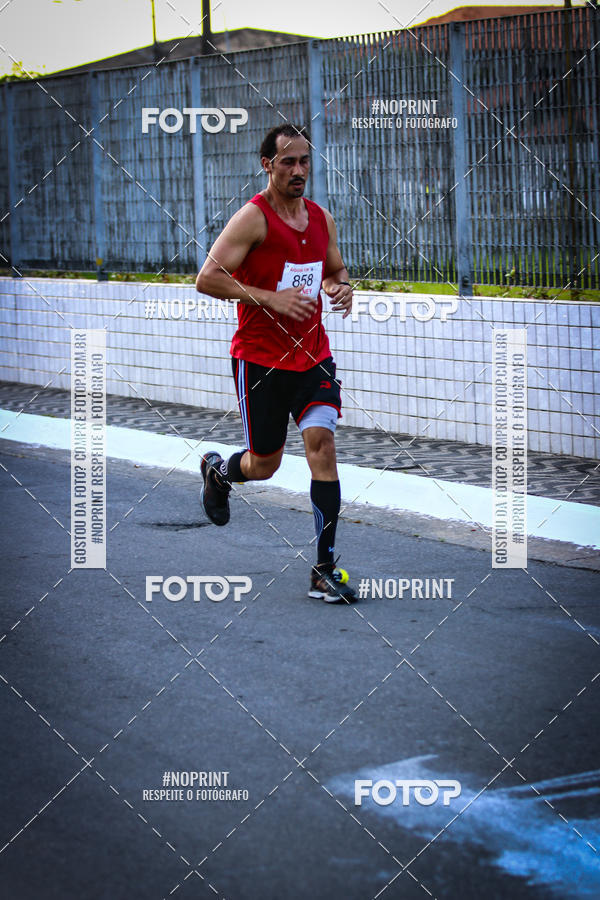 Buy your photos of the eventguia 13K Praia Grande on Fotop