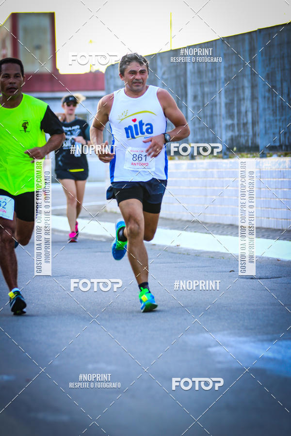 Buy your photos of the eventguia 13K Praia Grande on Fotop