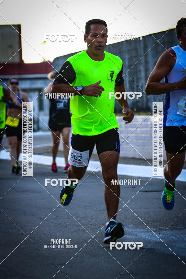 Buy your photos of the eventguia 13K Praia Grande on Fotop