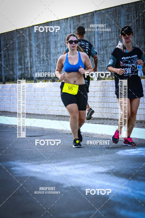 Buy your photos of the eventguia 13K Praia Grande on Fotop