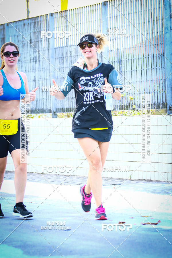Buy your photos of the eventguia 13K Praia Grande on Fotop