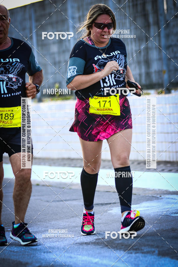 Buy your photos of the eventguia 13K Praia Grande on Fotop